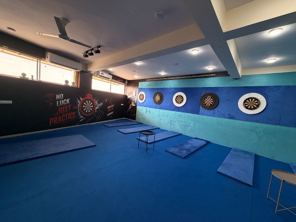 Modern darts training facility with multiple boards at Darts Club Palodia
